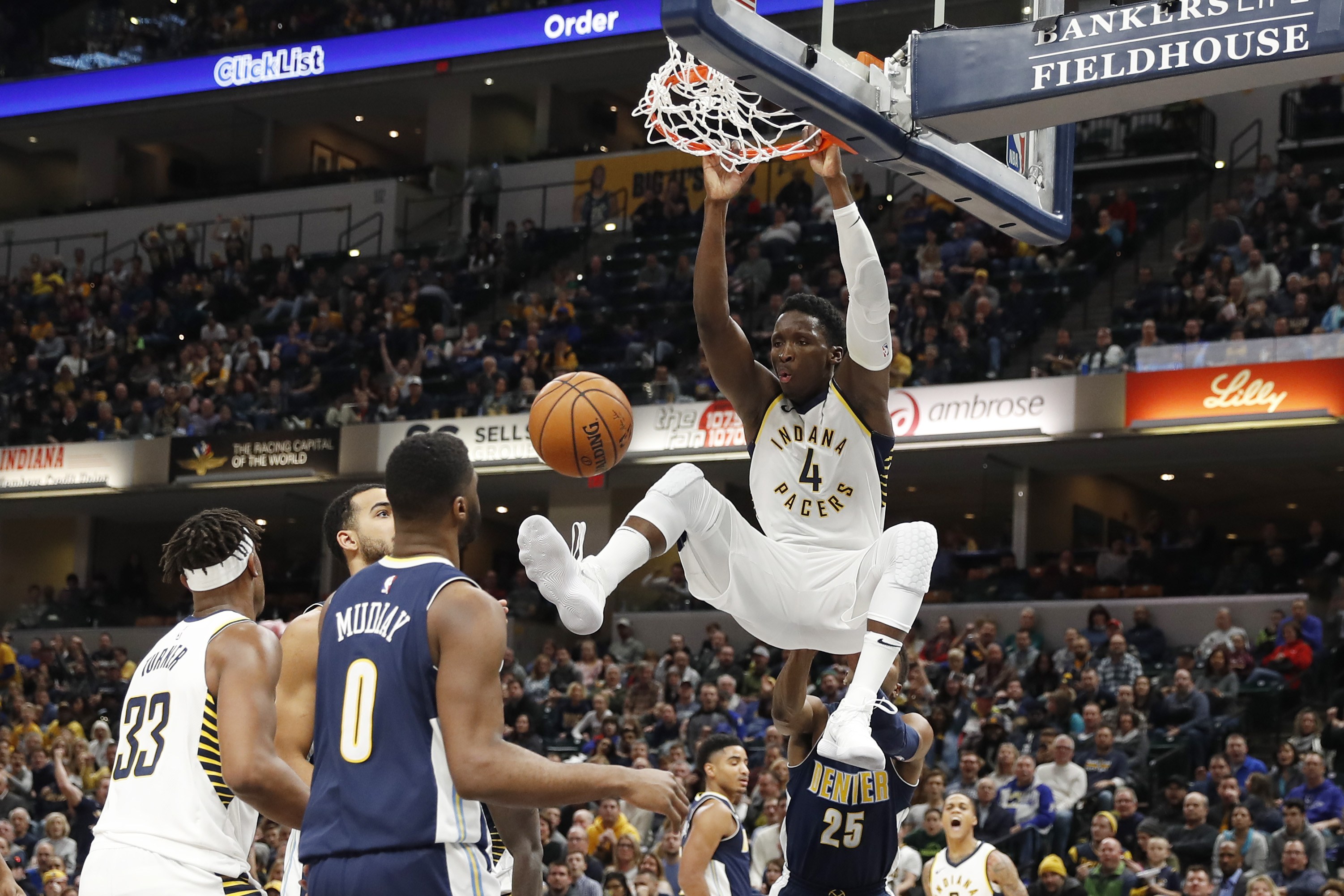 Dec 10, 2017; Indianapolis, IN, USA; Indiana Pacers guard Victor Oladipo (4) dunks against the Denver Nuggets during the 3rd quarter at Bankers Life Fieldhouse. Mandatory Credit: Brian Spurlock-USA TODAY Sports